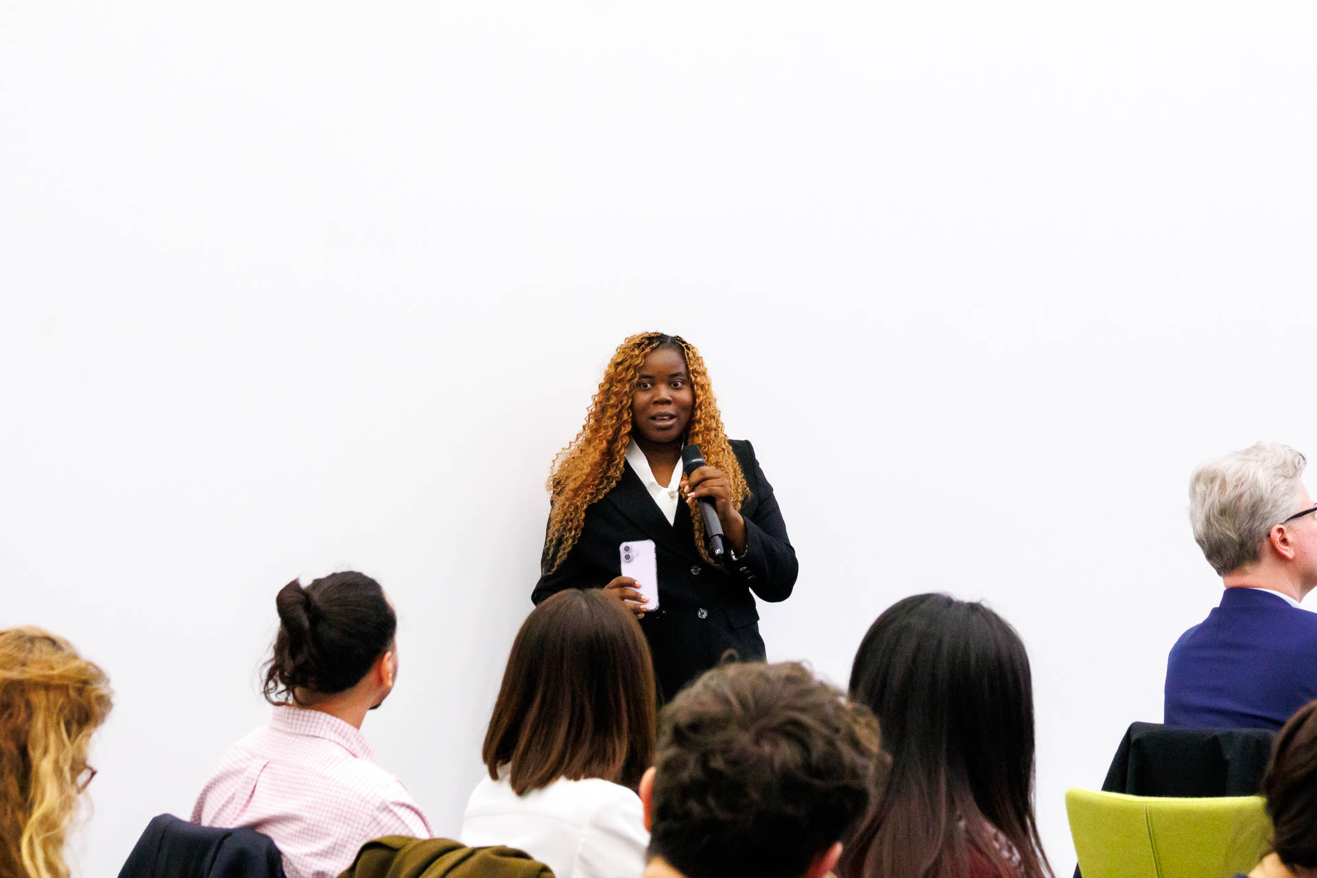 photo from the conference, speaker addressing the audience